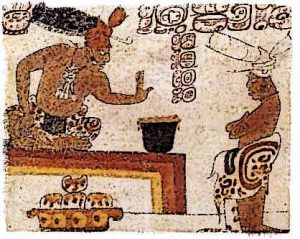 A Maya lord forbids an individual from touching a container of chocolate.